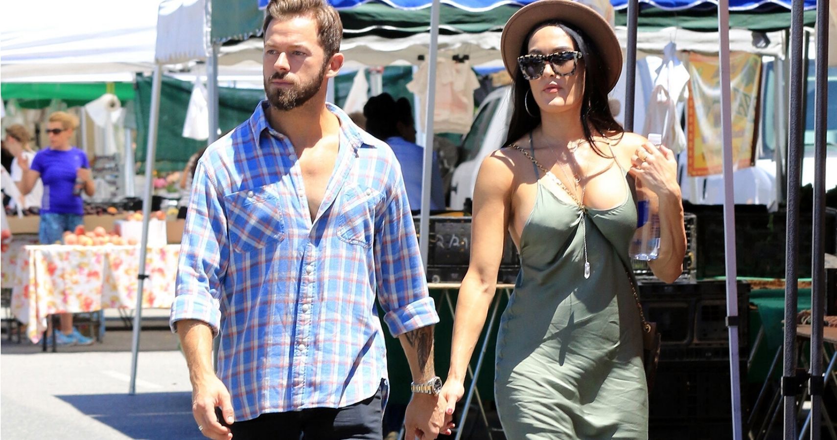 WWE Star Nikki Bella Addresses Why She Travels Without Her Fiancée & Baby 1